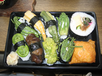 �R�؎��i�̐܂�l��